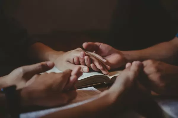 Image - Christian_group_are_praying_to_god_with_the_bible_and_sharing_the_gospel._Concept_of_faith_for_god.jpg